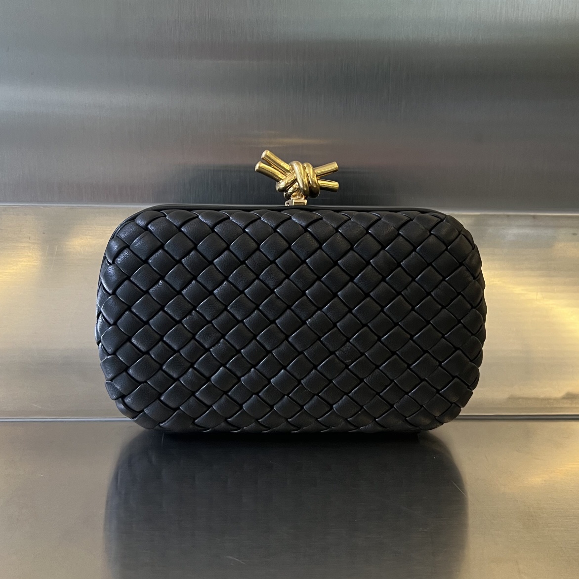 Knot Padded Intreccio Leather Clutch Black